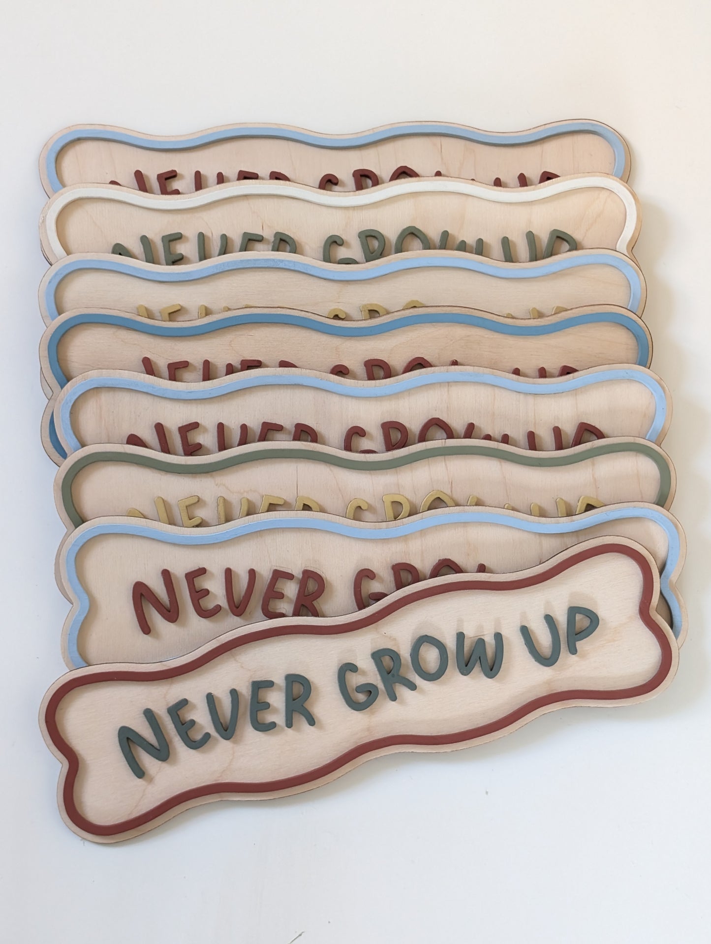 'Never Grow up' Wavy Sign